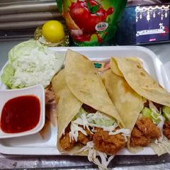 A picture of Crispy zinger roll with homemade tortilla bread and coleslaw😍.