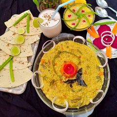 A picture of Vegetables rice, daliya and oats khichdi.