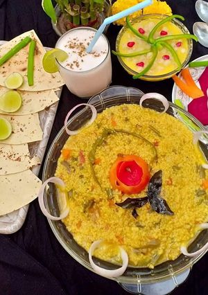 A picture of Vegetables rice, daliya and oats khichdi.