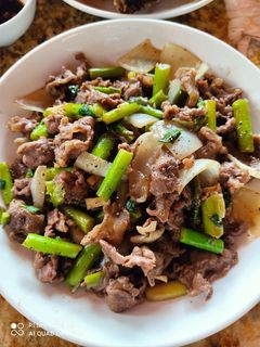 Hình của món Bắp bò xào măng tây.