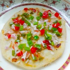 A picture of Mixed veg uttapam.