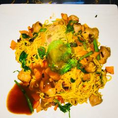 A picture of Timeless chicken noodles and sausage dinner.