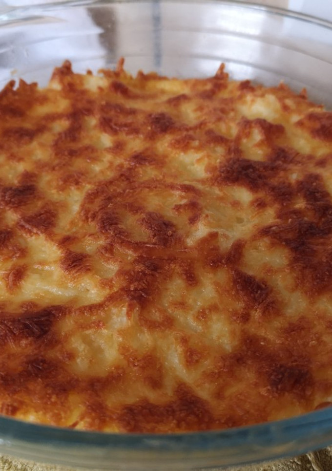 Una foto de Puré de papa gratinado