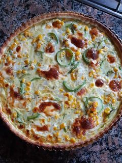 Una foto de 🌽Tarta de cebolla, zucchini y choclo🌽