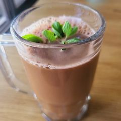 A picture of Carrot and amla juice.