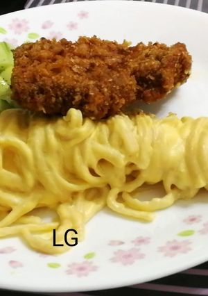 A picture of Tonkatsu With Carbonara.