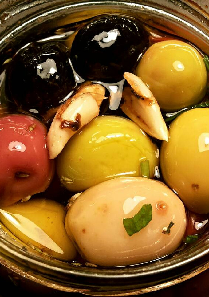 Una foto de Aceitunas especiadas en aceite virgen extra