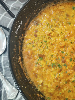 Una foto de Arroz meloso de bacalao y alga dulse