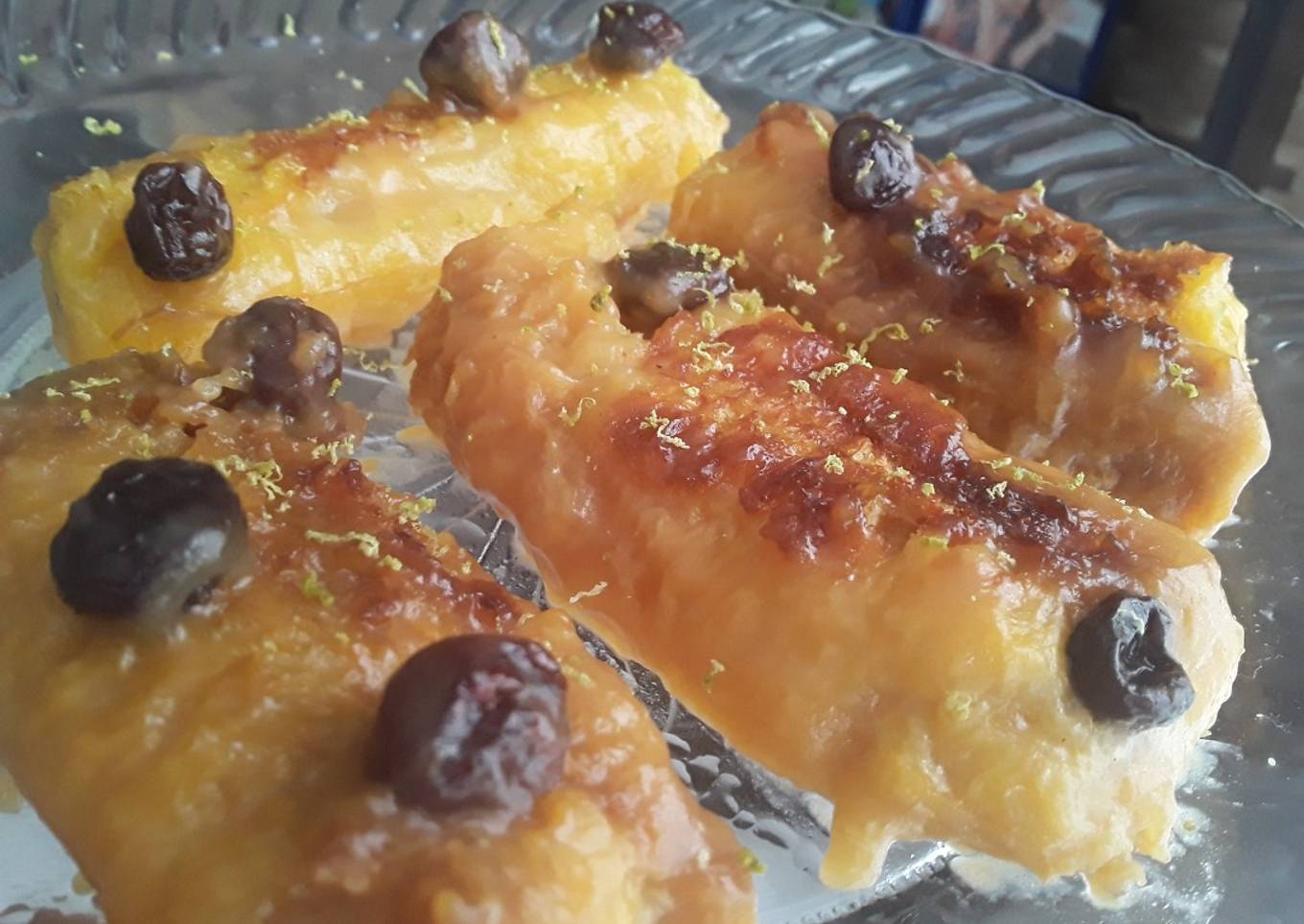 Plátanos maduros en leche y pasas de uva...🤔🍌🍇🍯🍶🥛🍯🍌