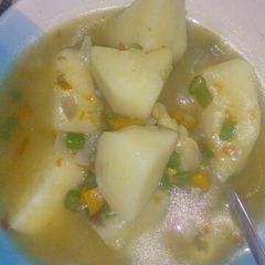A picture of Garnished porridge yam.