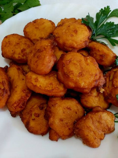 Una foto de Buñuelos de calabaza y parmesano rallado
