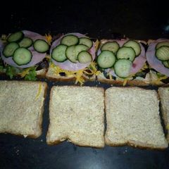 A picture of Cheese and ham sandwiches.