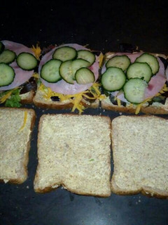 A picture of Cheese and ham sandwiches.