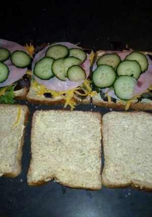 A picture of Cheese and ham sandwiches.