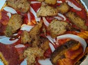 Una foto de pizza vegana