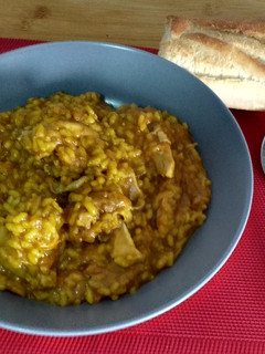 Una foto de Arroz caldoso con pollo