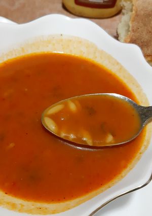A picture of Tomato Orzo Soup 🍴🍞.