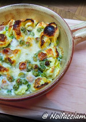 A picture of Tortellini with Cream, Ham, and Peas.