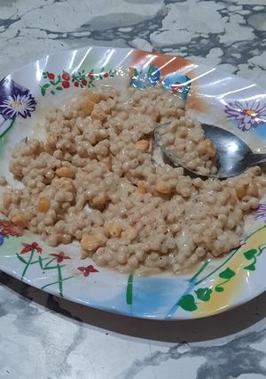 Una foto de Municiones, choclo, escamas de cebolla ahumada - ensalada fría