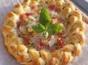 Une photo de tarte courgettes tomates