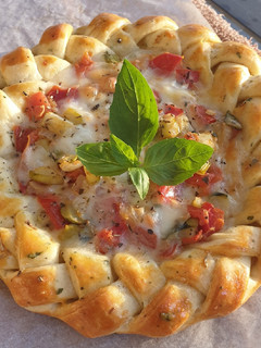Une photo de Tarte Tomates Courgettes Mozza