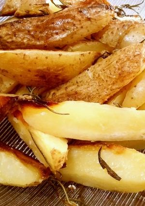Una foto de Papas al romero