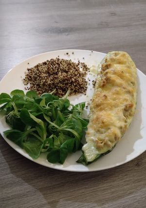 A picture of Cheesy filled zucchini with quinoa.