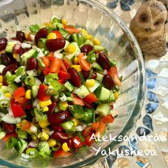 A picture of Vegetable salad with red beans.