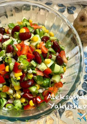 A picture of Vegetable salad with red beans.