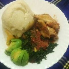 Ugali,chicken,muchicha/terere with avocado A picture of Ugali,chicken,muchicha/terere with avocado.
