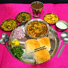 Fiery Spicy Kolhapuri Puneri Misal Pav - The Pride Of Every Maharashtrian House & Street Food A picture of Fiery Spicy Kolhapuri Puneri Misal Pav - The Pride Of Every Maharashtrian House & Street Food.