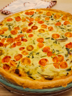 Una foto de Quiche de espinacas, ricota y champiñones