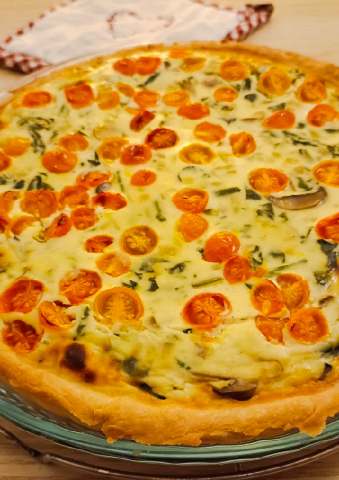 Una foto de Quiche de espinacas, ricota y champiñones