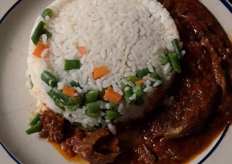 Smoked fish stew with rice