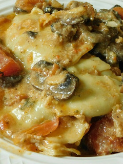 A picture of Ravioli (cheese and spinach stuffed Ravioli) Mushroom cream sauce.