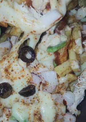 A picture of Pizza fries 🍕 🍟.