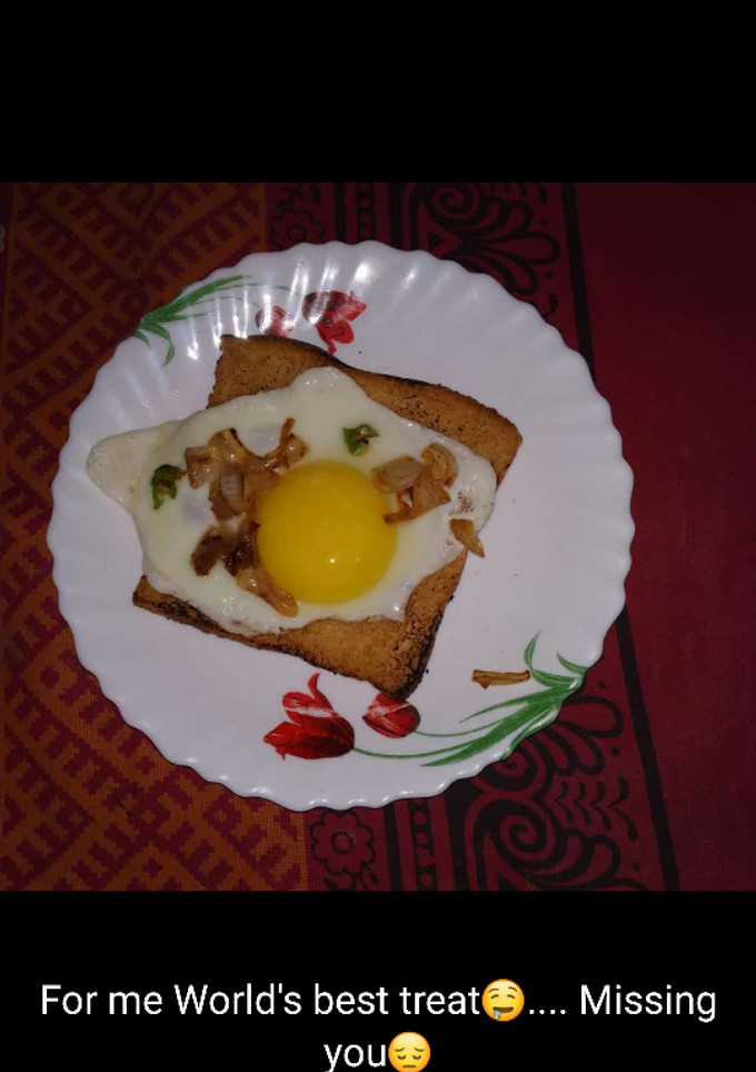 A picture of Egg halffry with toast.