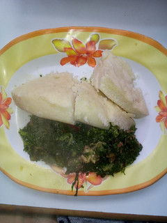 A picture of Ugali and sukuma wiki.