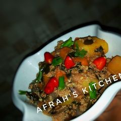A picture of Eggs and potatoes sauce.