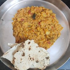 A picture of Sambhar rice.