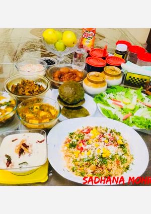 A picture of Potato Butter Masala,Mater-Paneer,Khatta -Meetha Kaddu,Spinach Pooris.