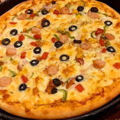 A picture of 🍕Cheesy Smokey tikka pizza🍕.
