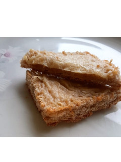 Una foto de Cuadraditos de pan con mucho queso