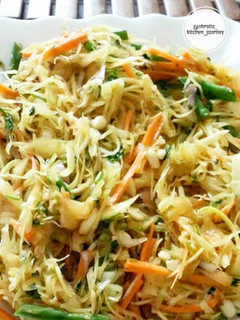 A picture of Som tum salad or raw papaya salad.