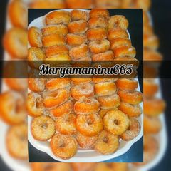A picture of Doughnut coating with sugar and cinnamon.