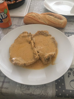Una foto de Bistec de cerdo en salsa