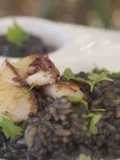 Creamy black rice with squid and olive oil recipe