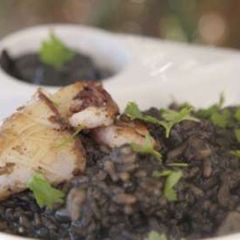A picture of Creamy black rice with squid and olive oil recipe.
