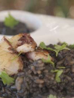 A picture of Creamy black rice with squid and olive oil recipe.