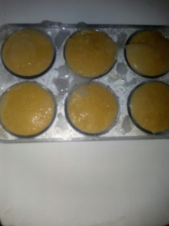A picture of Coco-mango popsicles.